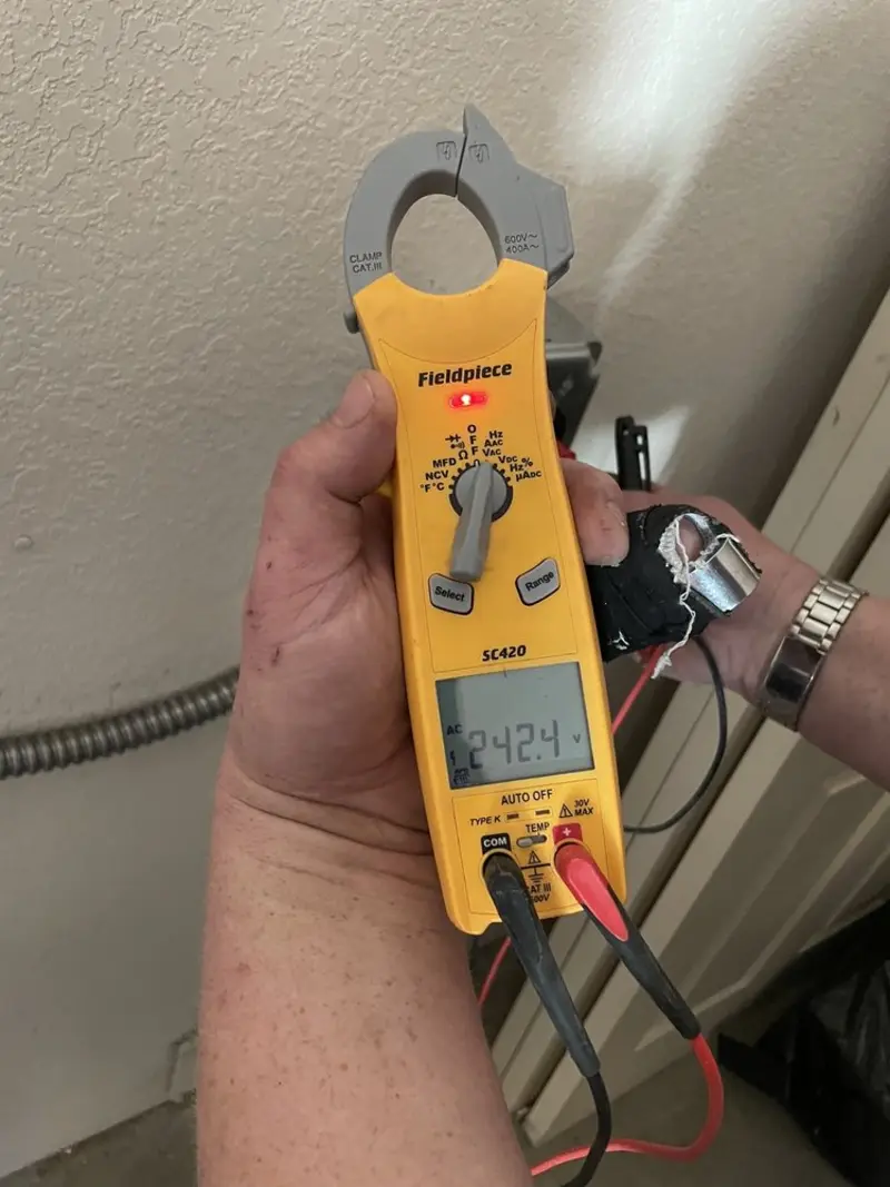 Voltage testing with clamp meter during Hot Tub / Pool Electrical Wiring in Wapakoneta